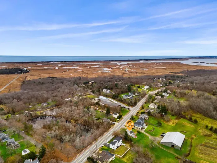 Aerial view, home overlooking the private organic produce farm