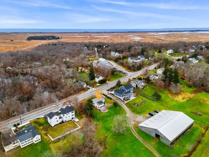Aerial view, home overlooking the private organic produce farm