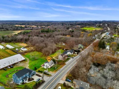Aerial view, home overlooking the private organic produce farm