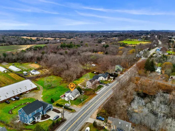 Aerial view, home overlooking the private organic produce farm
