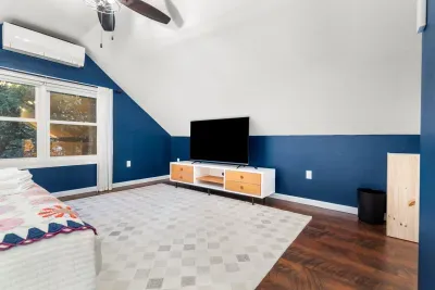 Primary bed with king bed and smart TV with the ability to login to your streaming services