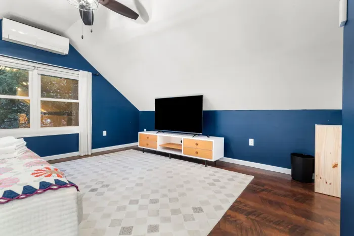 Primary bed with king bed and smart TV with the ability to login to your streaming services