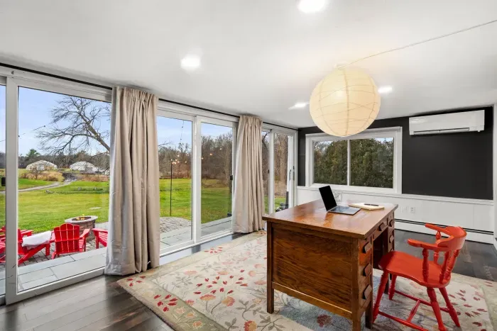 Work-from-home desk for productivity looking out over the organic farm