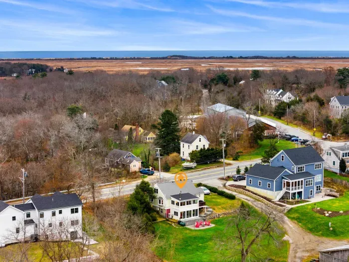 Aerial view, home overlooking the private organic produce farm