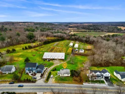Aerial view, home overlooking the private organic produce farm