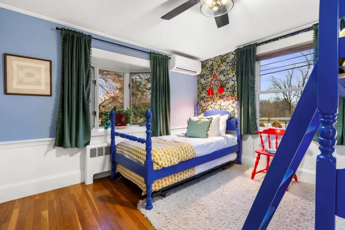 Bedroom #3 featuring 4 twin beds - twin-over-twin bunk bed and twin bed with rolling trundle beneath