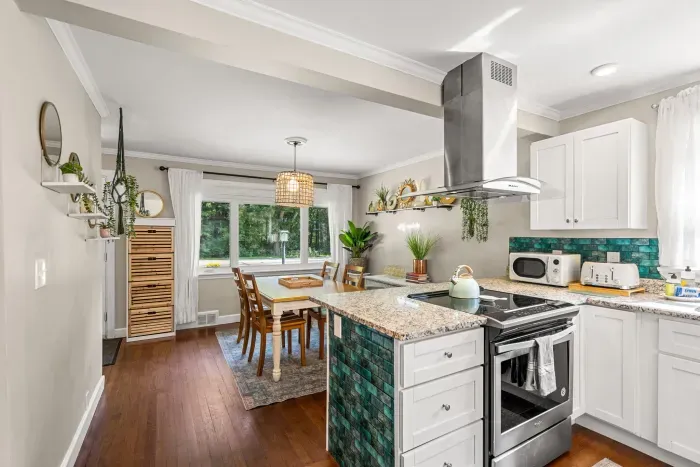 Dining area conveniently located across from the kitchen.