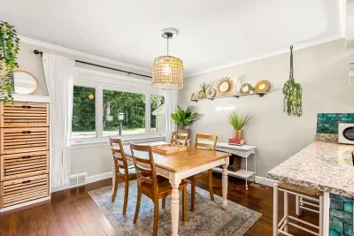 Dining area conveniently located across from the kitchen.