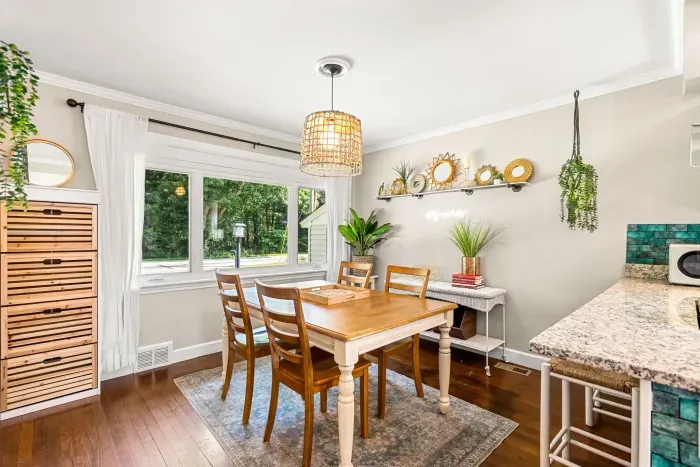 Dining area conveniently located across from the kitchen.