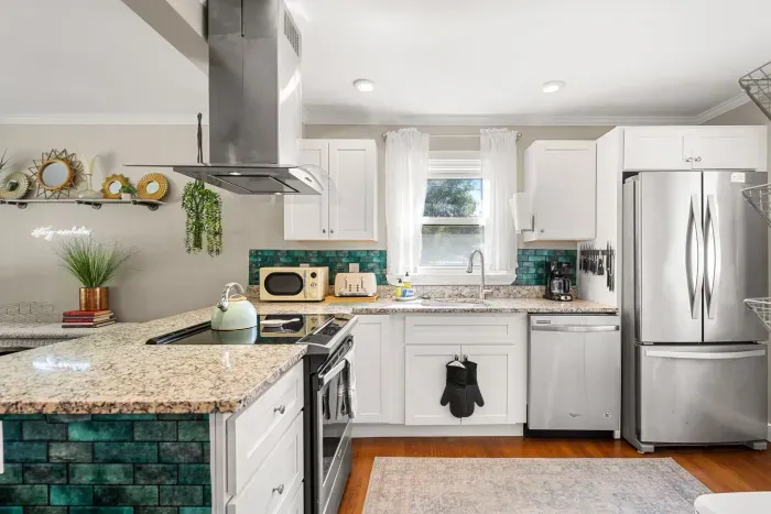 Generous, spacious kitchen perfect for cooking and gathering.