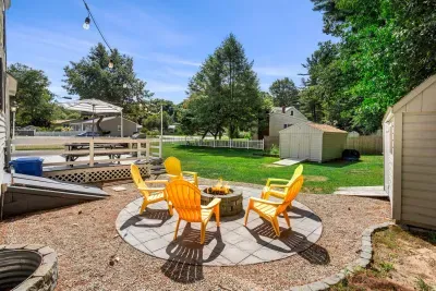 Cozy firepit seating for five—perfect for unwinding and sharing stories under the stars. 🌟🔥