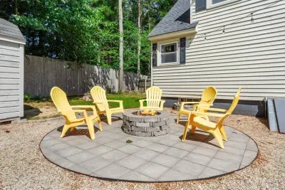 Cozy firepit seating for five—perfect for unwinding and sharing stories under the stars. 🌟🔥