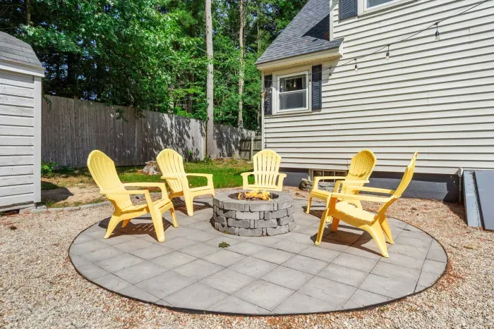 Cozy firepit seating for five—perfect for unwinding and sharing stories under the stars. 🌟🔥