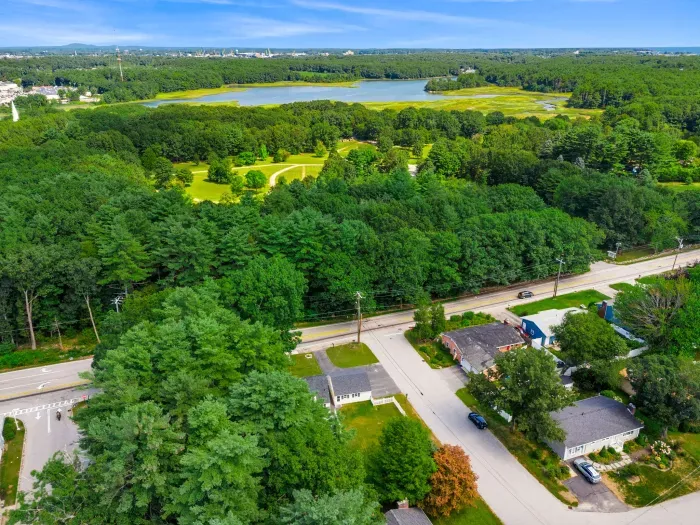An aerial view showcasing the neighborhood's close proximity to local establishments while offering the privacy and security you desire.