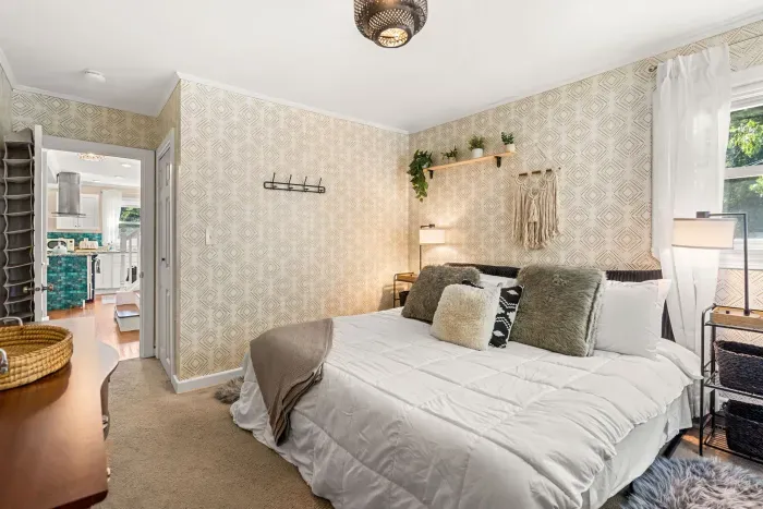 Cozy king bed with plenty of space to unwind after a long day. 🛏️✨