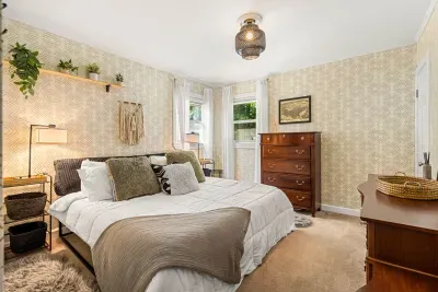 Cozy king bed with plenty of space to unwind after a long day. 🛏️✨