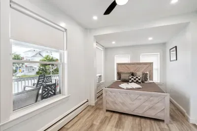 Bedroom #1 with queen bed and smart TV