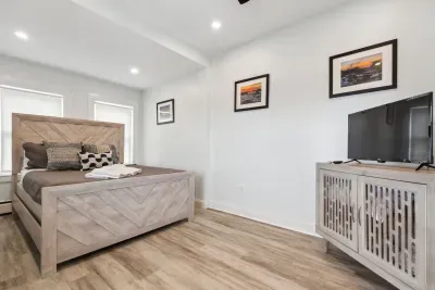 Bedroom #1 with queen bed and smart TV