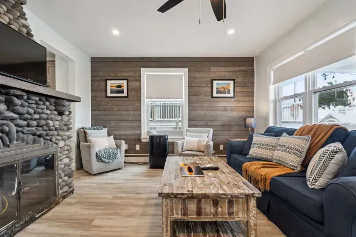 Cozy and spacious living room with smart TV and game table (fireplace inoperable)