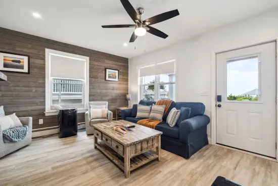 Cozy and spacious living room with smart TV and game table (fireplace inoperable)