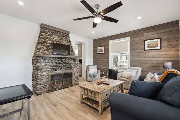 Cozy and spacious living room with smart TV and game table (fireplace inoperable)