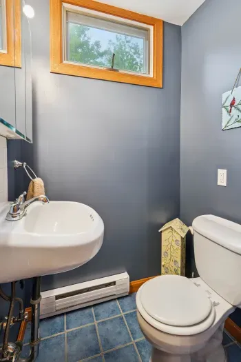 Half bath located off the kitchen/dining area