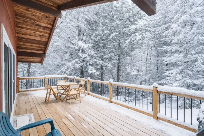 New large deck accessed via the living room! There are peek a boo mountain views off to the right, and a gas grill!