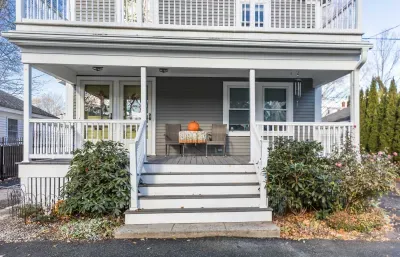 The front porch shared between both units. The door to your unit is the left door.