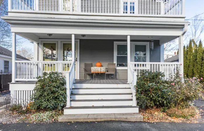 The front porch shared between both units. The door to your unit is the left door.