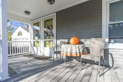 The front porch shared between both units. The door to your unit is the left door.