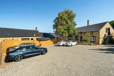 Spacious private parking area with convenient access to the historic property. There is one (1) private parking space for guests