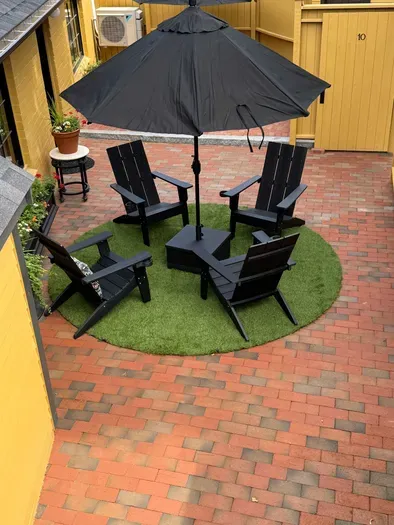 Outdoor patio area with seating for 4 people