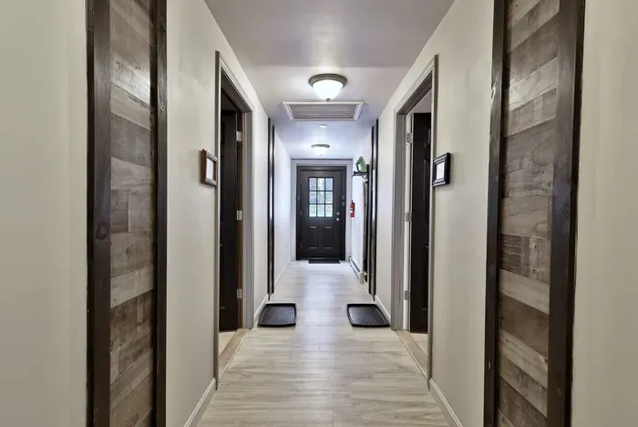 Ben & Jerry - Common area hallway. Long Trail Suite located on your left.