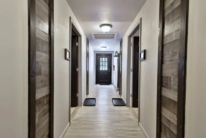 Long Trail - Common area hallway. Long Trail Suite located on your left.