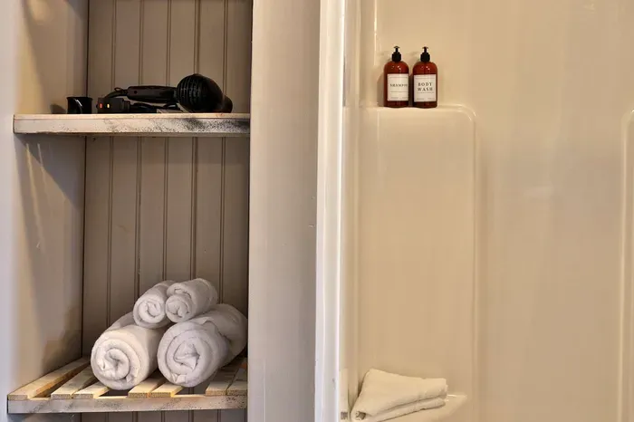 Long Trail - Standing shower includes shampoo and body wash and complimentary towels.