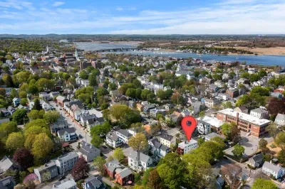 Aerial view -- Steps to Newburyport's water front, short walk to State Street and the Rail Trail. 3 miles to Plum Island.