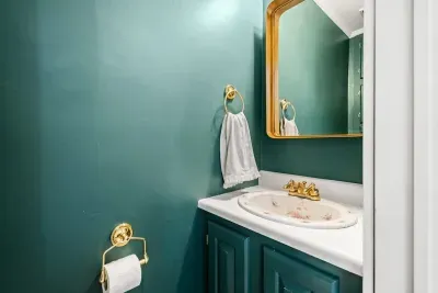 half bathroom located on the first floor.