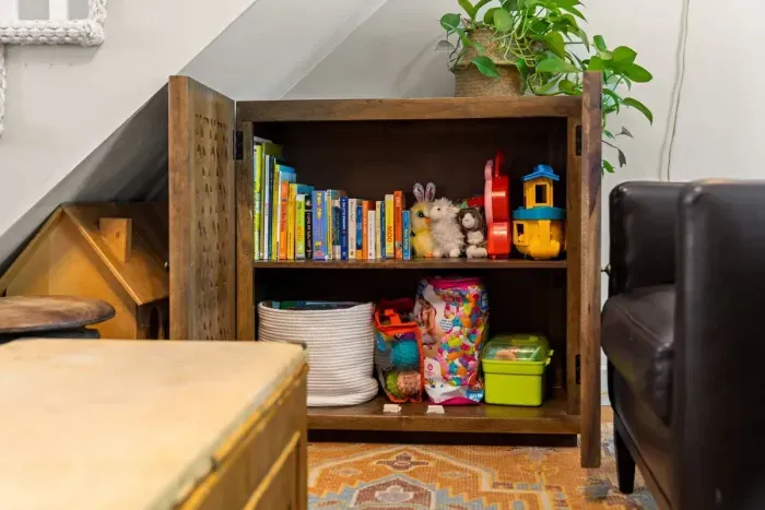 Game cabinet, located in the first level living room.