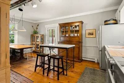 fully equipped kitchen with dining room table and all major appliances.