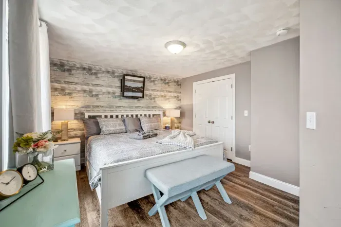 The primary bedroom with a king bed and mini split heating and cooling. Clean linens provided