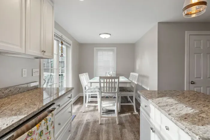Bright and inviting dining area featuring seating for 6 — perfect for family meals or gathering with friends.