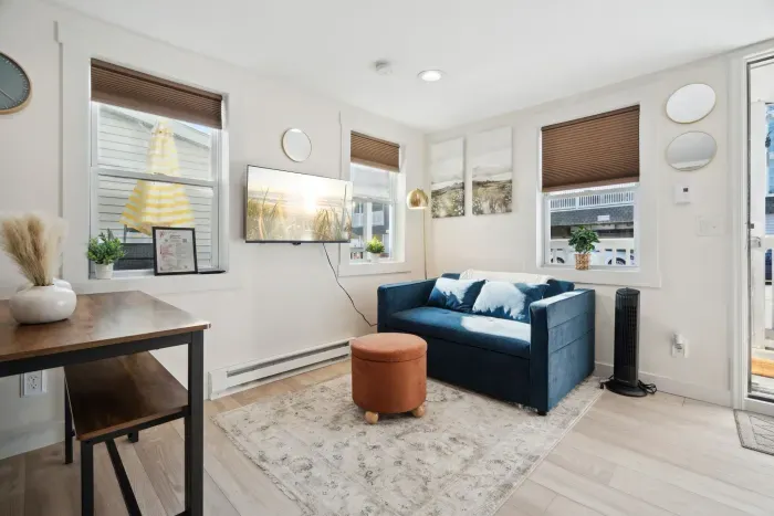 Cozy mini living room with a Smart TV for your streaming and relaxation needs!