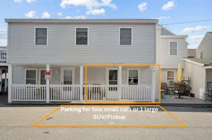 The front of the home and the parking space!