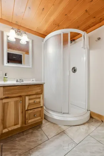 Bathroom #3 with sleek standing shower.