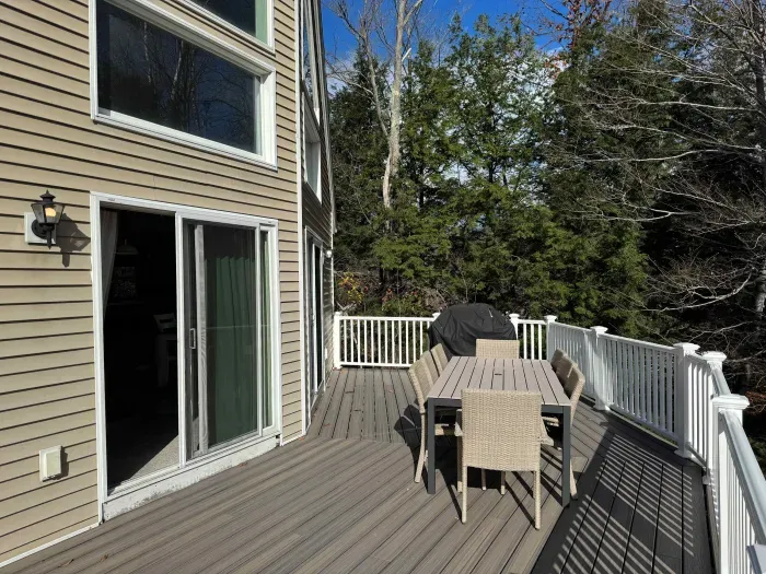 The new deck and new deck furniture! Featuring an 8 person dining table. Access the deck via the living room and kitchen area.