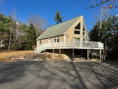 View from the driveway with the new deck!