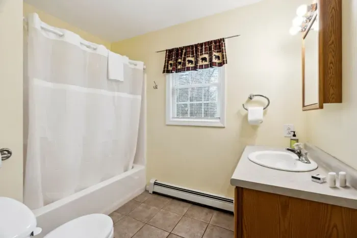 Bathroom #2 with tub/shower combo.