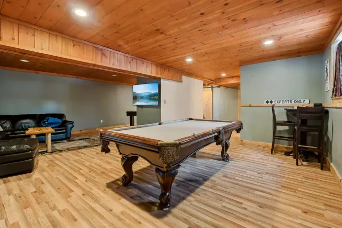 Triple the fun with foosball, pool table, and dart board.