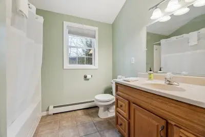 Bathroom #1 with tub/shower combo.