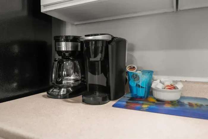 Two coffee makers: Keurig and regular coffee maker